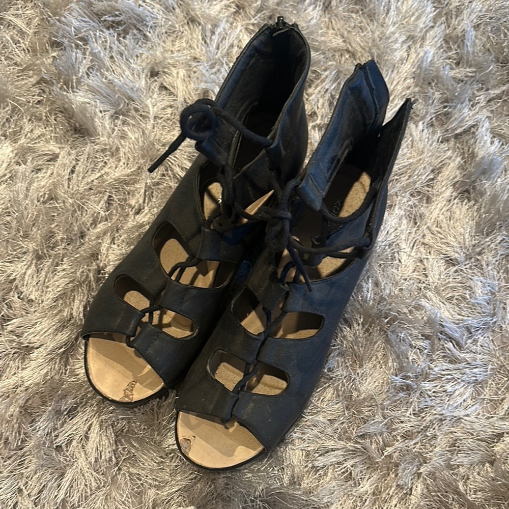 Black Lace Up Boots with Intricate Design